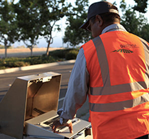 worker inspecting his tools for landscape management